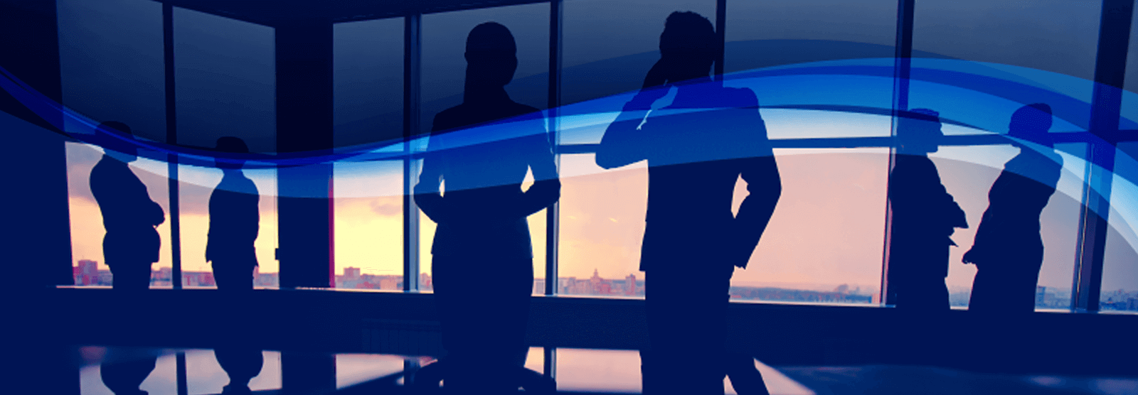 Silhouettes of conference attendees standing near tall windows overlooking a city skyline at sunset, with warm amber and blue tones